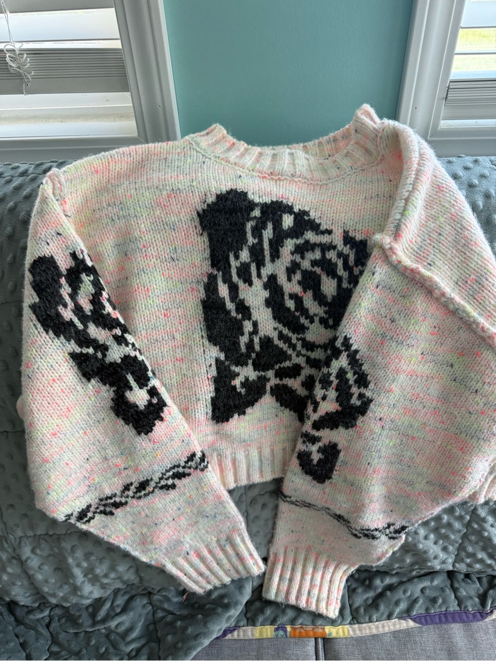 Altar'd State Pink Speckled Cropped Sweater with Black Rose Motif